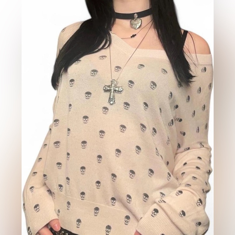 SOLD ! baby pink and black skull v neck sweater